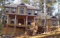 Roof on, windows going in